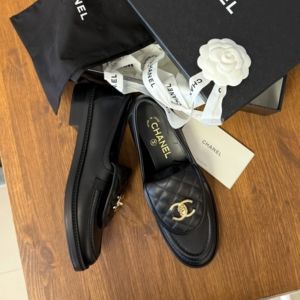 Chanel Black Quilted Tab Lambskin Flap Loafers